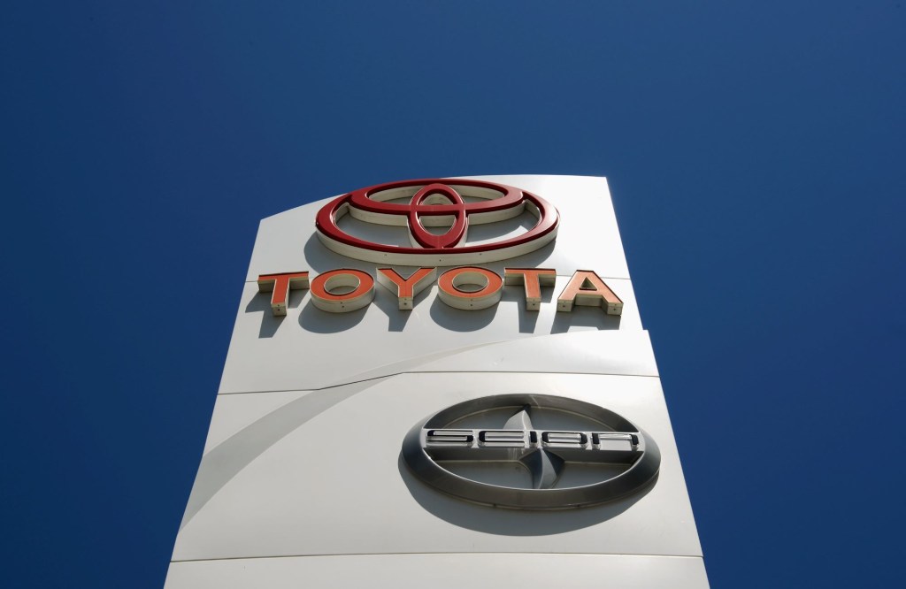 A car dealership sign with the Toyota and Scion logos located in Los Angeles, California