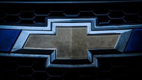 A gold Chevy logo is seen on a vehicle grille on December 21, 2017