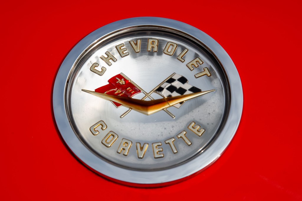 The classic Chevrolet Corvette logo with the two flags and the gold V with 'Chevrolet Corvette' written on it.