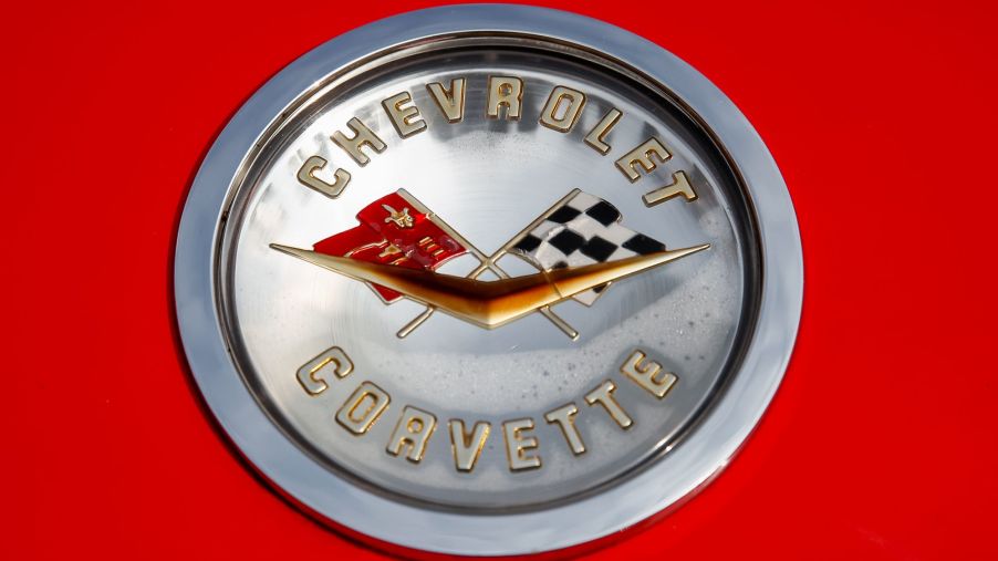 The classic Chevrolet Corvette logo with the two flags and the gold V with 'Chevrolet Corvette' written on it.