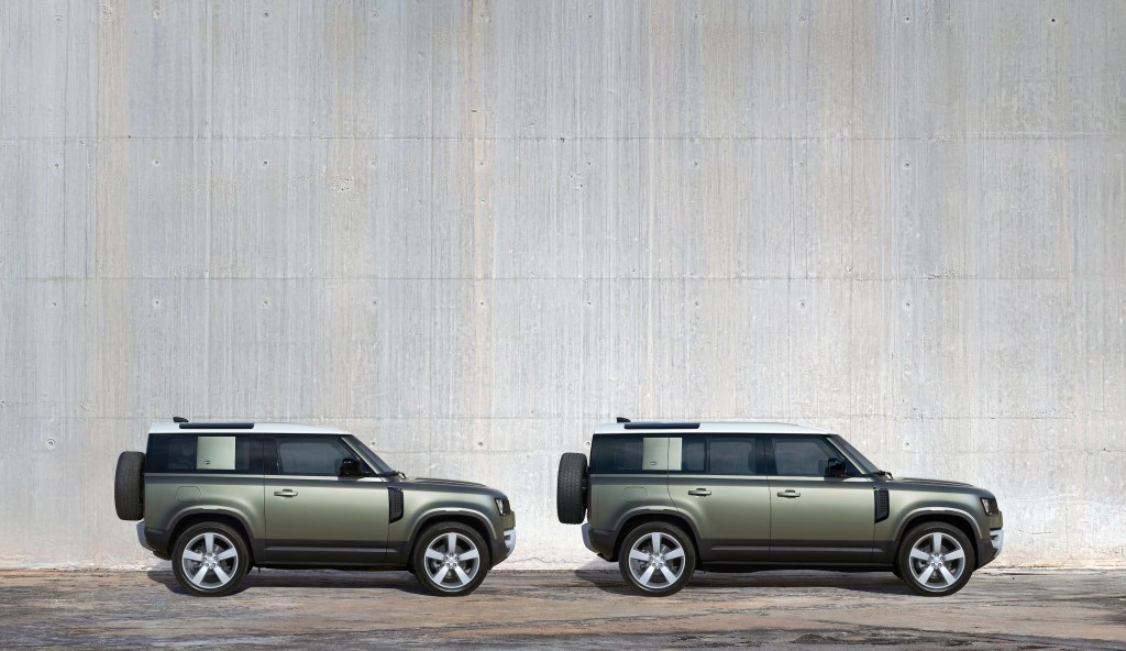 a pair of new Defenders. One is the four-door 110 and the other is the two-door Defender 90