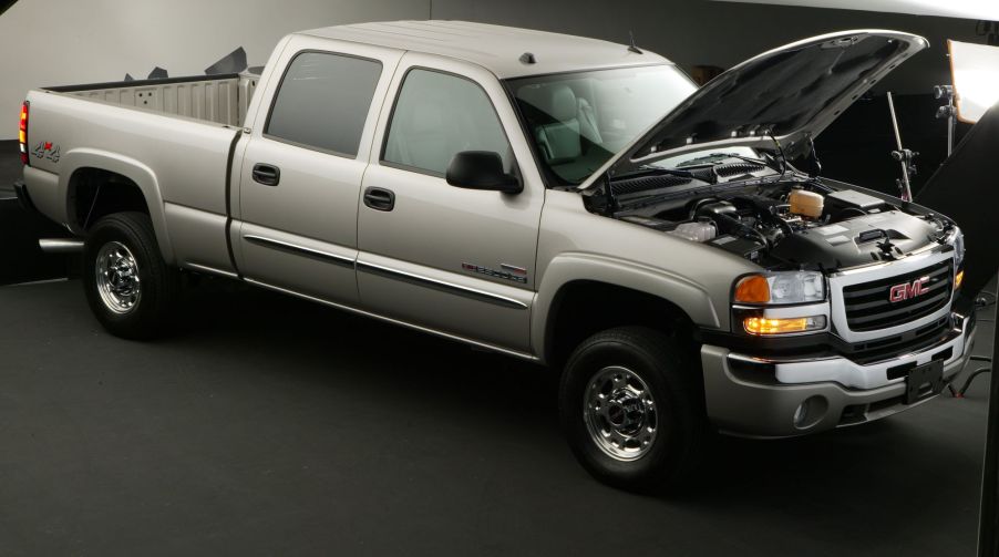 A 2005 GMC diesel pickup truck model with its hood raised