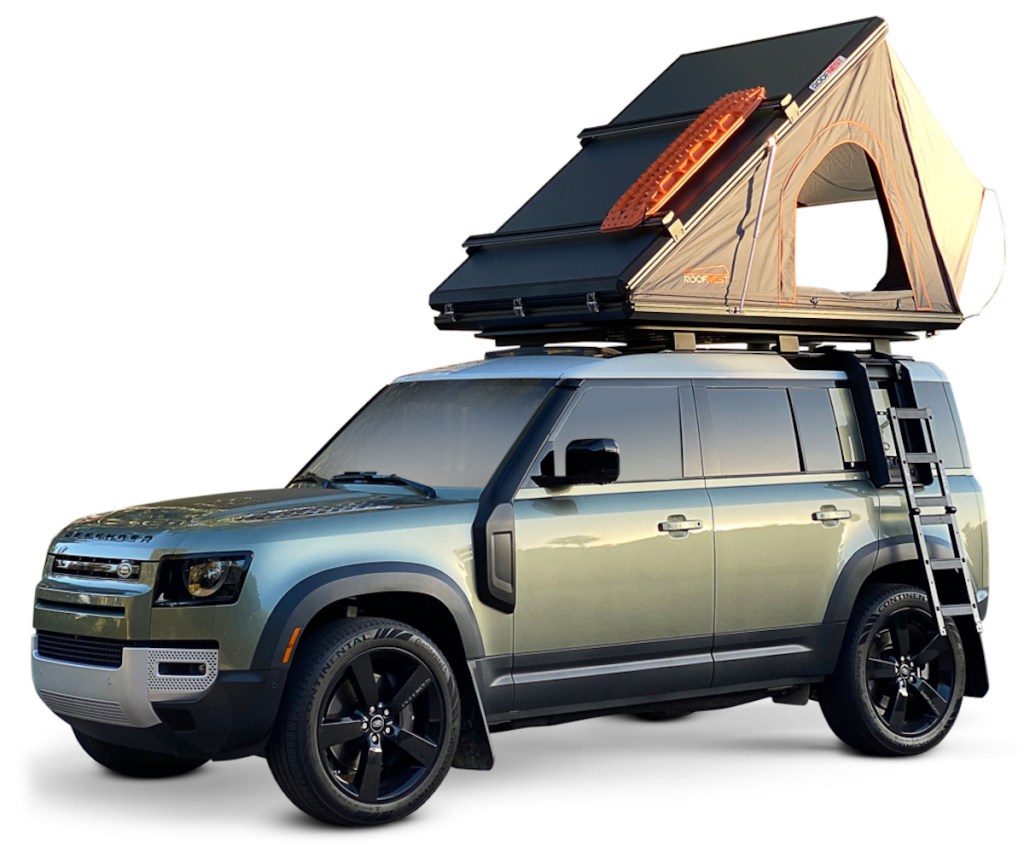 Publicity shot of The Falcon Hardshell Rooftop Tent | Roofnest. One of the 5 Best Rooftop Tents For Overlanding -- According to Popular Mechanics