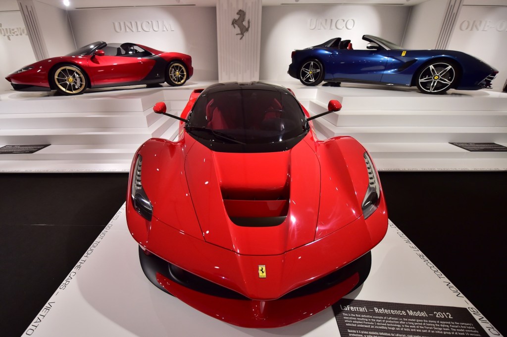 A red Ferrari LaFerrari hypercar, similar to the one collector David Lee purchased, is on display inside the Ferrari Museum in Maranello, Italy, in October 2015
