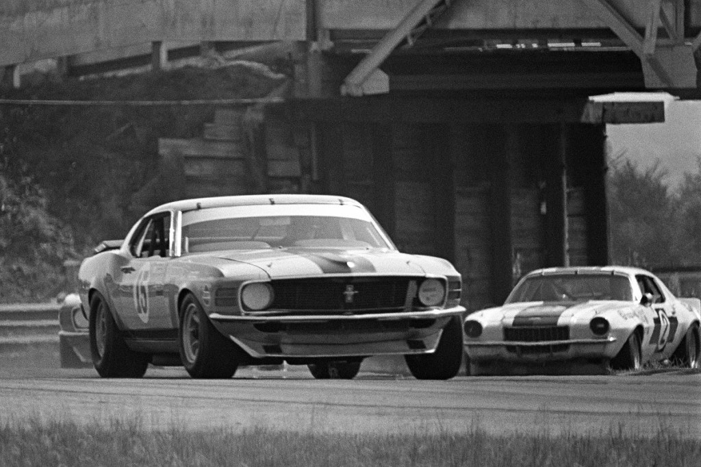 A Ford Mustang on an outdoor racetrack.