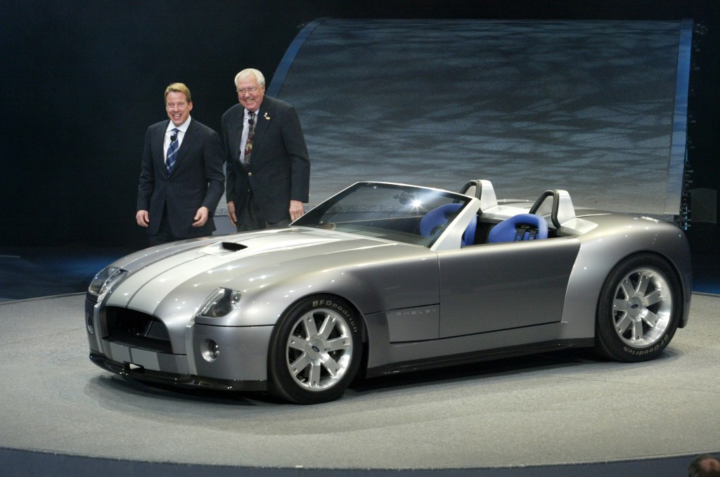 Carroll Shelby and Bill Ford Jr. introduce the Ford Shelby Cobra Concept at the North American International Auto Show 2004 in Detroit