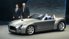 Carroll Shelby and Bill Ford Jr. introduce the Ford Shelby Cobra Concept at the North American International Auto Show 2004 in Detroit