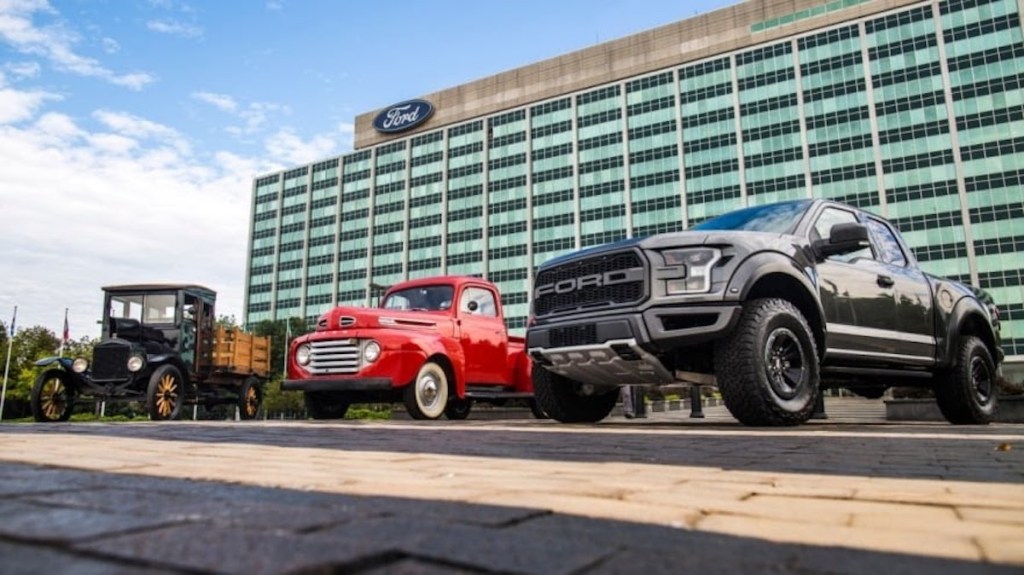 This publicity shot is a lineup of Ford trucks from over a century of truck building. Ford F-150 VS Toyota Land Cruiser: Which Is More Iconic?