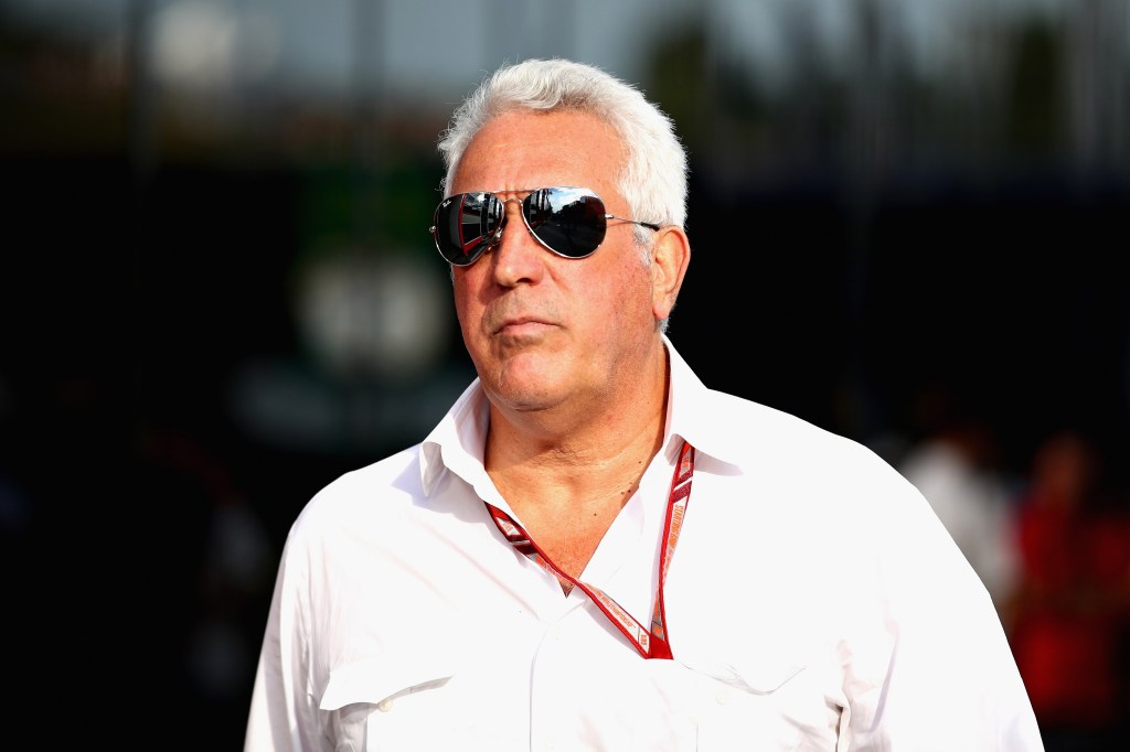 Stroll does his best "serious businessman" face at the Hungarian GP, complete with serious businessman aviators