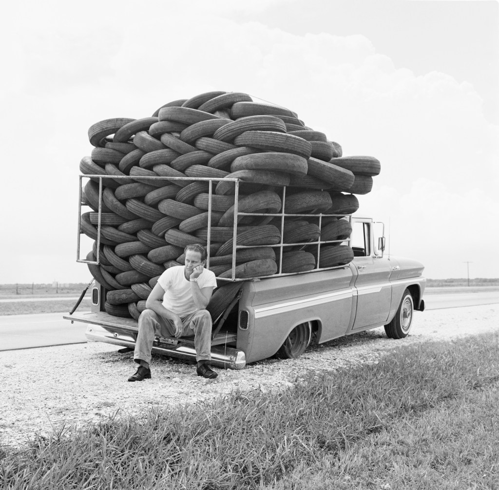 A man experiences irony as his car, laden with used tires, has a flat tire, Houston, Texas, March 1966. (Photo by Michael Ochs Archives/Getty Images). Use our tire load index chart explained to find your max tire weight.