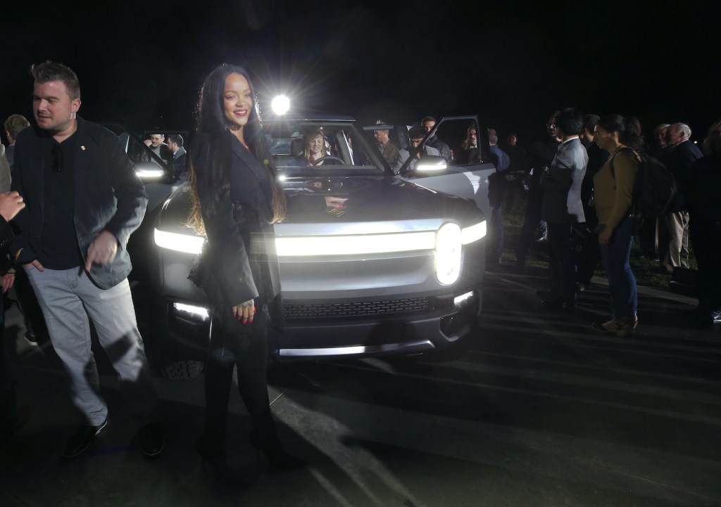 LOS ANGELES, CALIFORNIA - NOVEMBER 26: Rihanna attends Rivian Unveils First-Ever Electric Adventure Vehicle Before Its Official Reveal At The LA Auto Show at Griffith Observatory on November 26, 2018 in Los Angeles, California. (Photo by Phillip Faraone/Getty Images for Rivian) | Rivian IPO: Backed By Amazon And Ford, Startup Files For $80 Billion