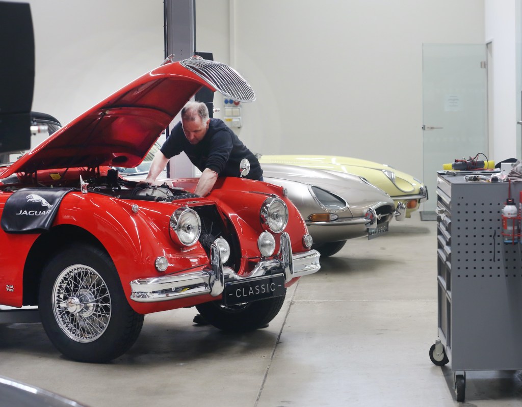 08 April 2019, North Rhine-Westphalia, Essen: A Jaguar XK 120 from 1949 repaired in the Jaguar Landrover Classic Center by workshop master Marco Walter. The car dealership for English classic cars also shows its cars at the Techno-Classica trade fair. Photo: Roland Weihrauch/dpa (Photo by Roland Weihrauch/picture alliance via Getty Images) Do open recalls change a car's trade-in value?