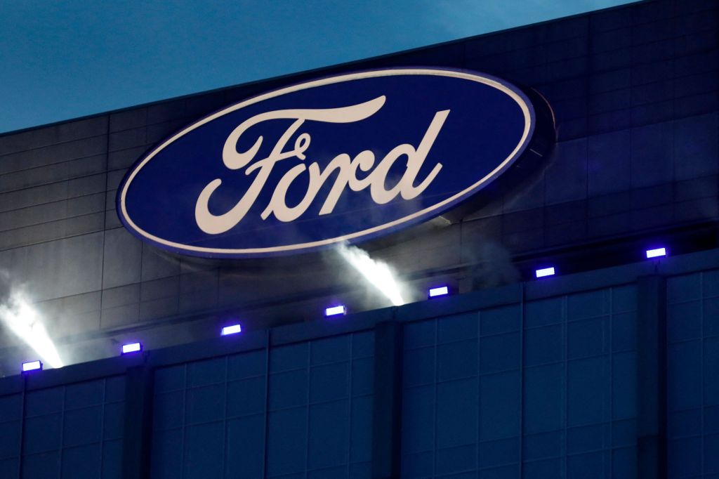 The blue oval Ford Motor Company logo on the side of a Ford truck factory 