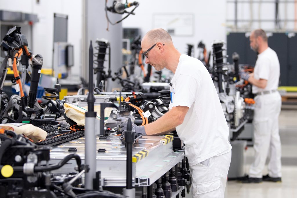 Workers in a Volkswagen plant assemble batteries for the brand's ID.3 models