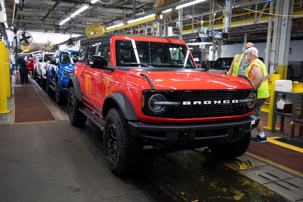 A red Bronco on the production line at Ford's plant in Michigan