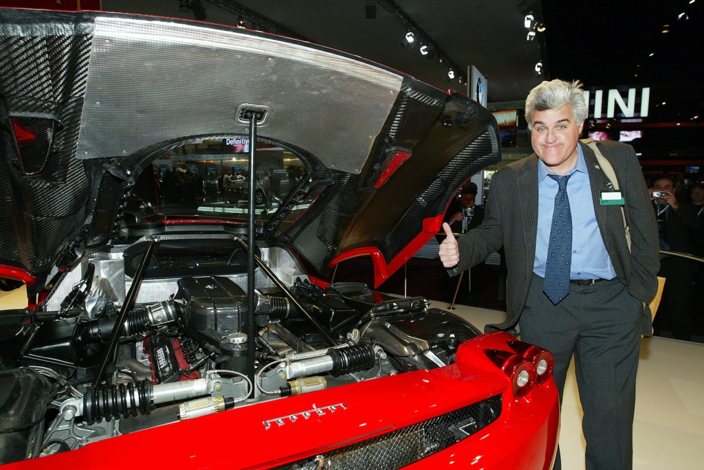 Jay Leno gives a read Ferrari Enzo a thumbs up at the Detroit auto show, so why doesn't Jay Leno own a single Ferrari?