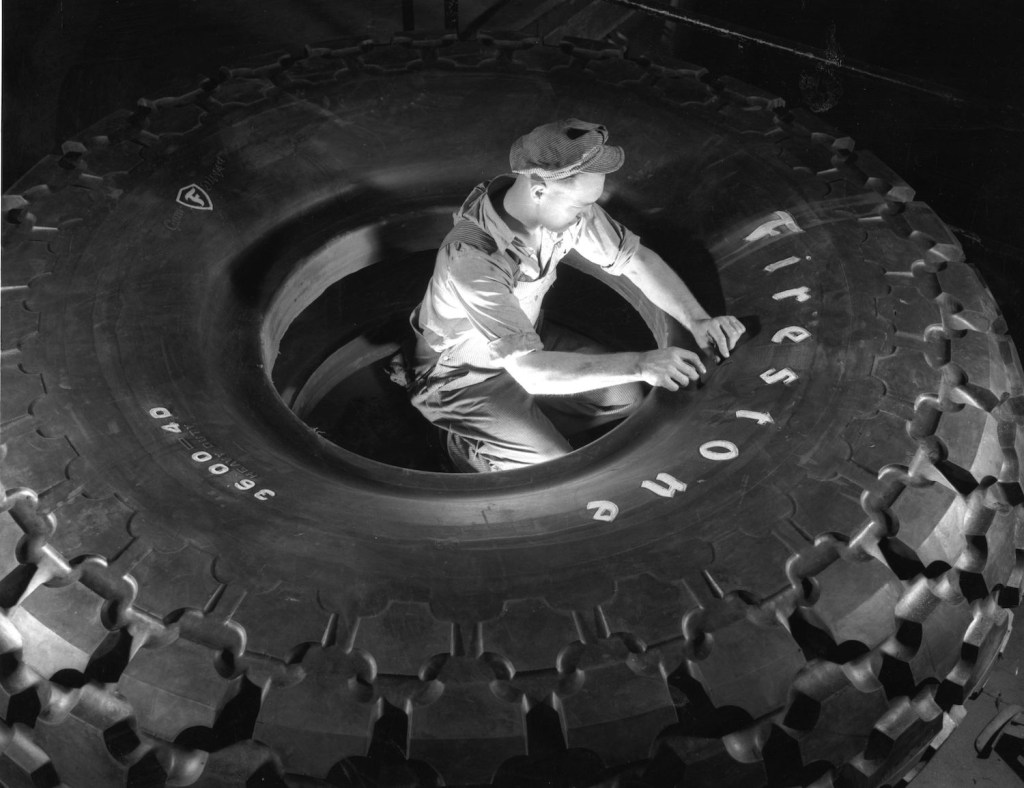 February 1942:  A tire standing 9 1/2 ft high and weighing 3,646 pounds constructed for a giant earth mover to be used in the construction of airports and army camps. The factory is in Ohio, the USA's leading rubber producer.  (Photo by Alfred T. Palmer/MPI/Getty Images) Use our tire load index chart explained to find your max tire weight