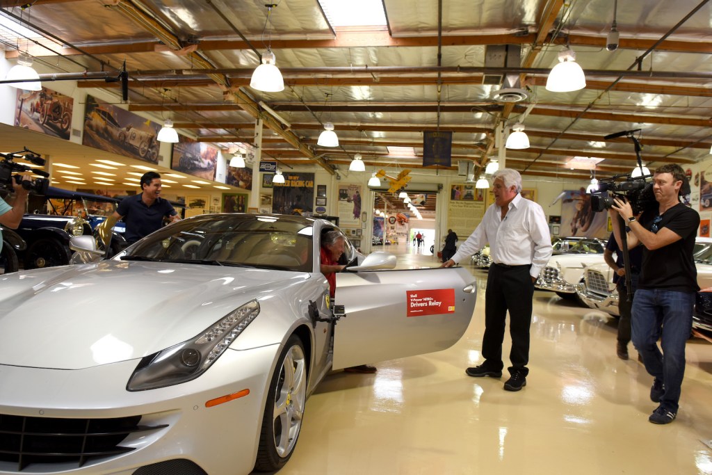 Jay Leno welcomes the driver of a Ferrari, during a cross-country relay, into his garage, with a smile. So why doesn't Jay Leno own a single Ferrari?
