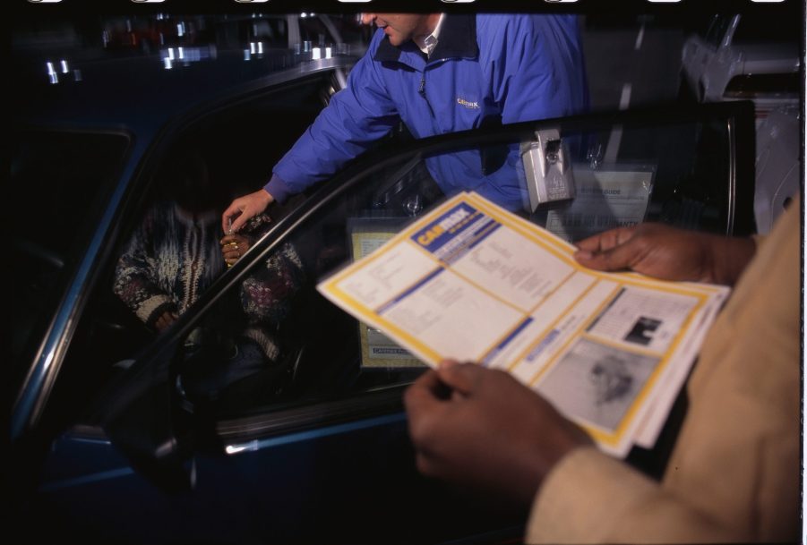 CarMax Salesman Handing Car Keys to Woman