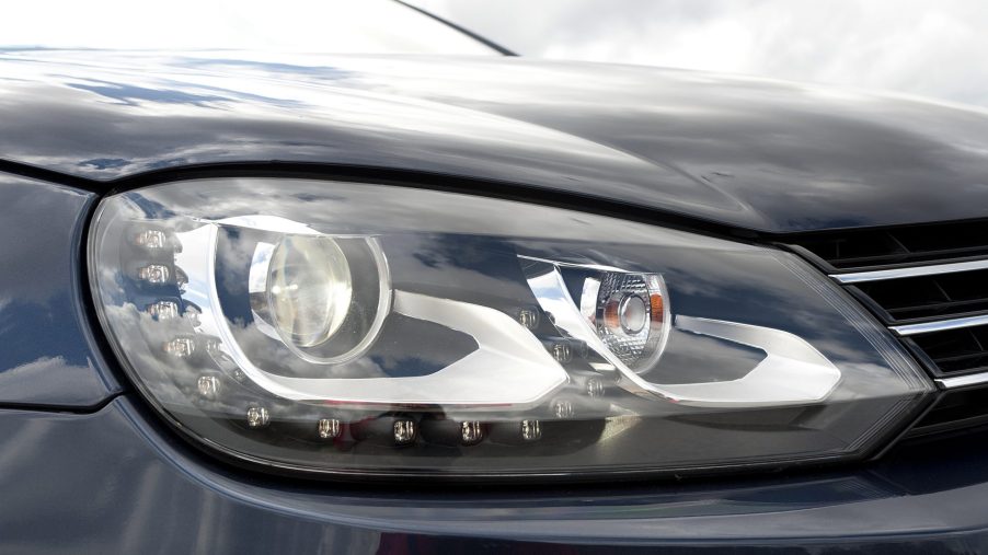 Nowhere is the cost of headlight repairs clearer than here. This blue Volkswagen Eos headlight is a $500 item