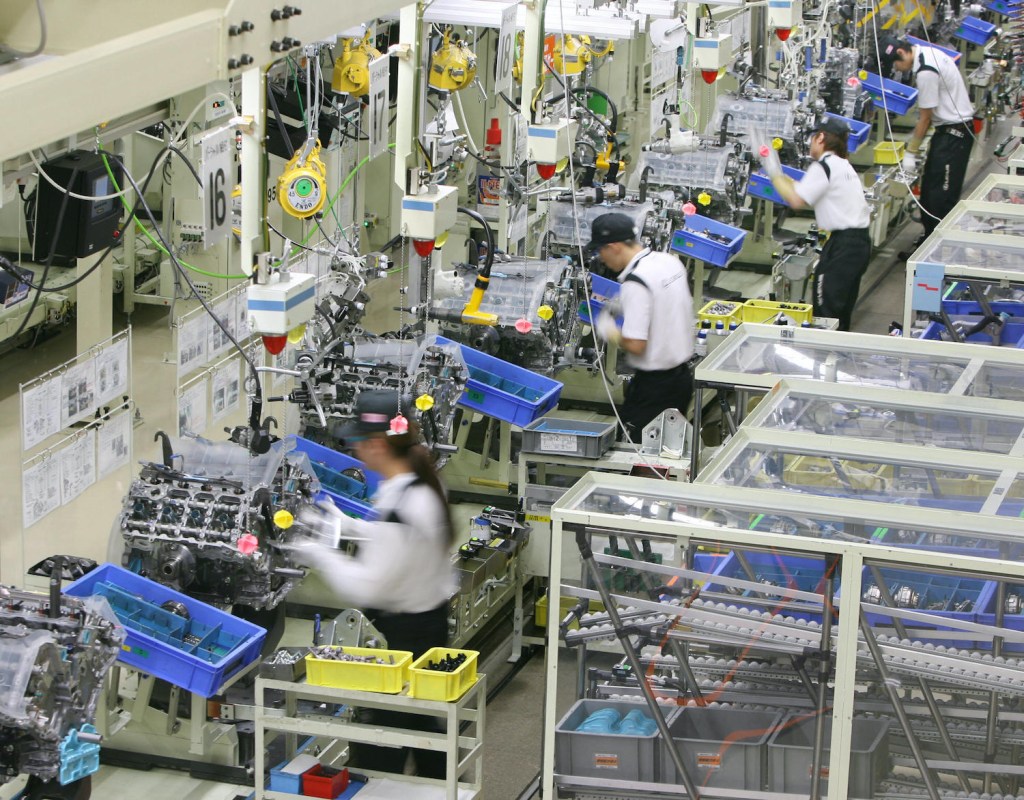 Tahara, JAPAN: Workers at Japan's auto giant Toyota motor assemble engines for LEXUS cars at the company's Tahara plant in Aichi prefecture, 28 June 2007. 670 Lexus were assembled in Tahara plant as production output per day, the company said. AFP PHOTO / KAZUHIRO NOGI (Photo credit should read KAZUHIRO NOGI/AFP via Getty Images). Learn to decode your toyota engine name with our Toyota engine family chart and engine feature table.