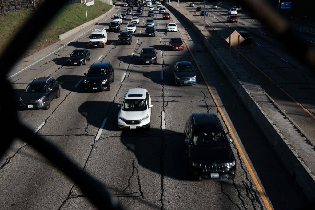 Motorists Driving In Highway Traffic