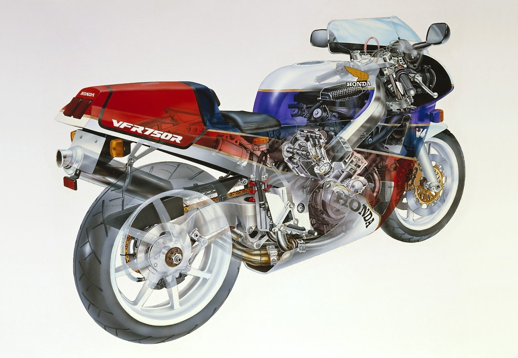 The rear 3/4 view of a cutaway white-blue-and-red Honda RC30