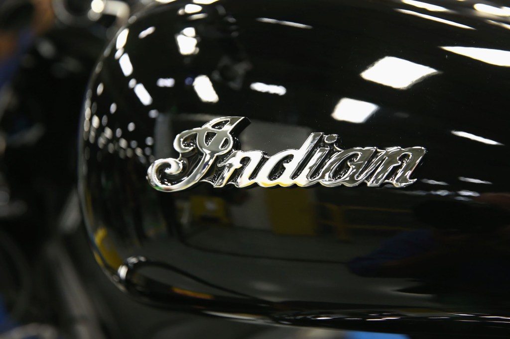 Indian Motorcycle's name written on a black motorcycle tank.