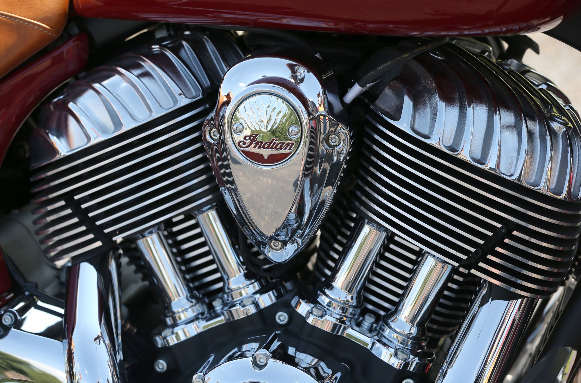 Indian Motorcycle's V-Twin engine with the logo on the plate in between the engines.
