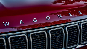 The Jeep Wagoneer and model lettering above the grille with a red paint color option