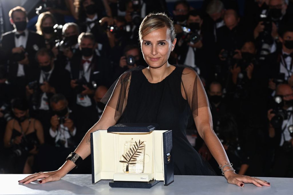 Julia Ducournau with the Palme d'Or 'Best Movie Award' for 'Titane' during the 74th annual Cannes Film Festival