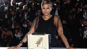 Julia Ducournau with the Palme d'Or 'Best Movie Award' for 'Titane' during the 74th annual Cannes Film Festival