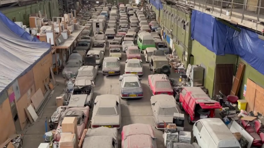 bird's eye view of massive collection of barn find vintage cars went up for auction in the U.K.