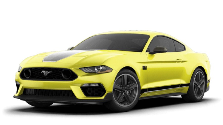 A yellow 2021 Ford Mustang Mach-e against a white background.