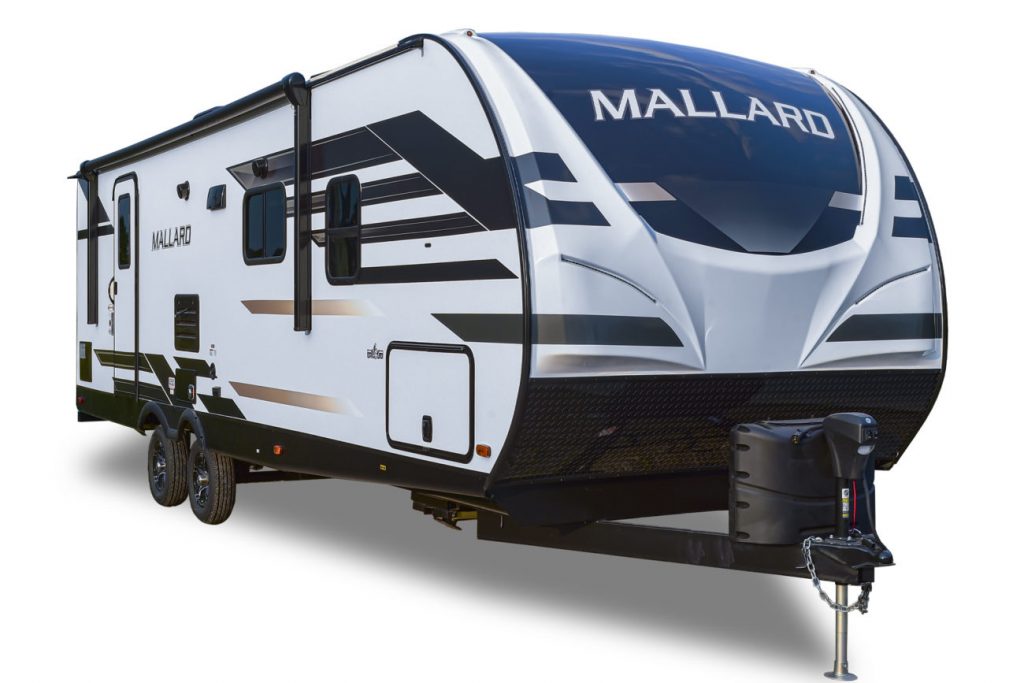 a front quarter view of the Mallard travel trailer in a press photo against a white backdrop