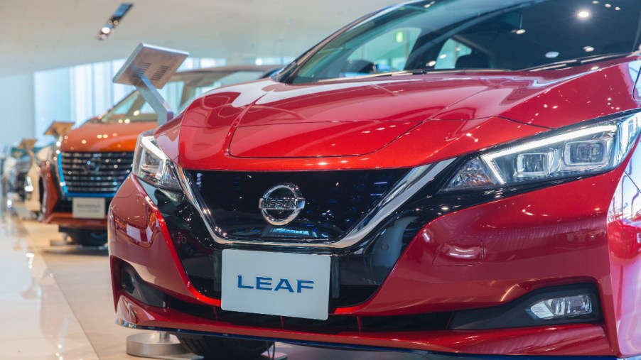 A red Nissan Leaf.