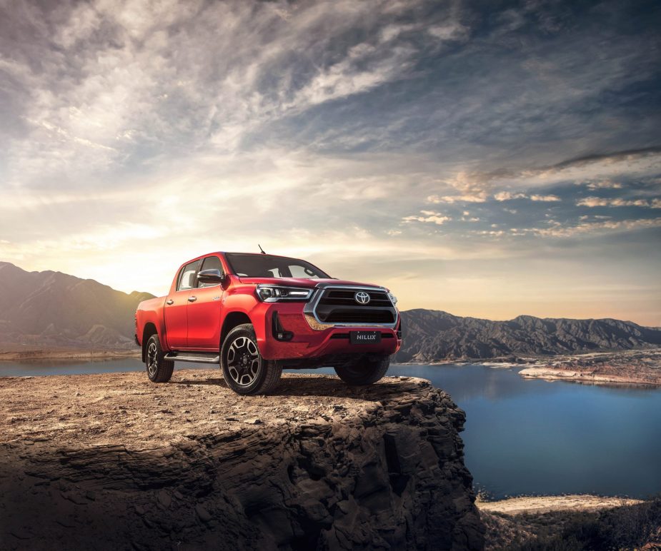 A 2021 Toyota Hilux sits on a cliffside