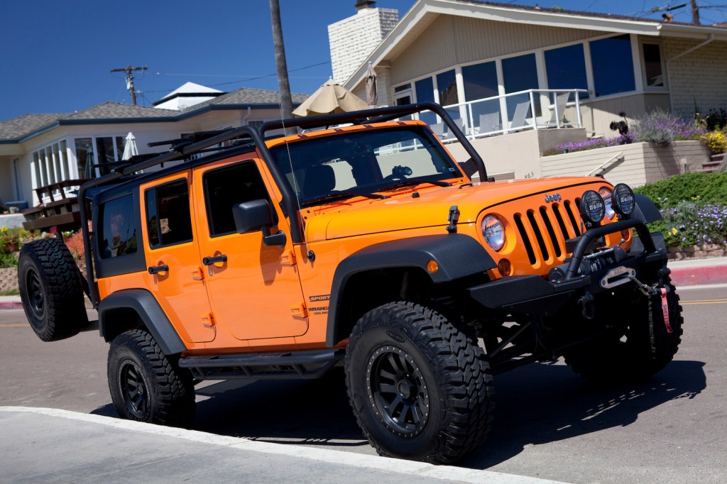 An orange Jeep Wrangler, LeBron James is one of the world's richest celebrities and once owned a Jeep Wrangler