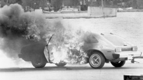 A Ford Pinto burns.