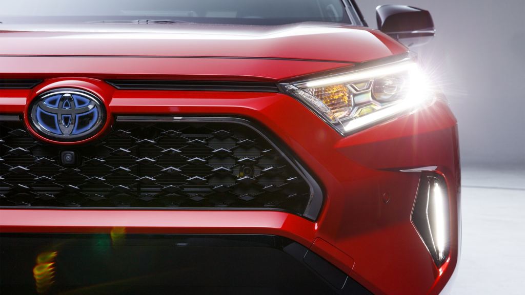 The front of a red 2021 Toyota Rav4.