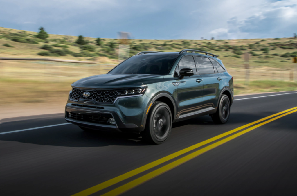 the 2021 Kia Sorento driving down the road