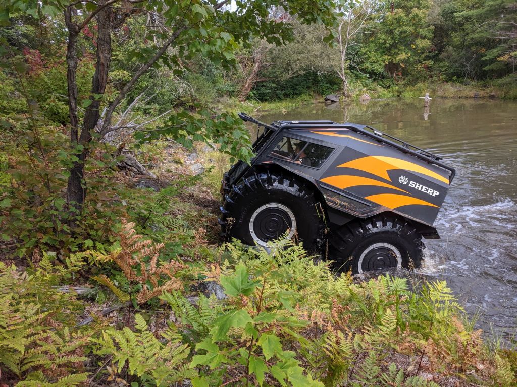 The Sherp ATV amphibious vehicle model exiting water