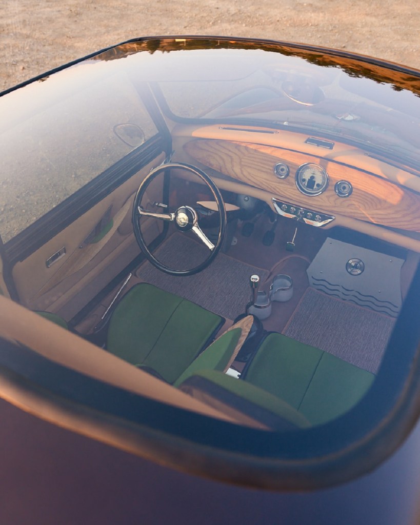 An overhead look through the sunroof of the Spectre Type 10's interior