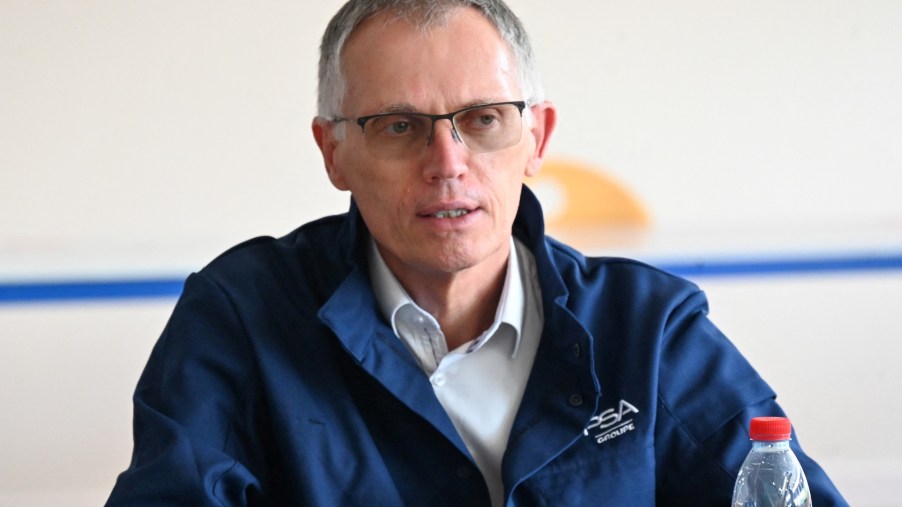 Stellantis CEO Carlos Tavares answers journalists' questions after a private visit at the plant of Dutch multinational automotive manufacturing company Stellantis on July 2, 2021