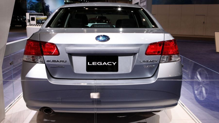 A damaged Subaru Legacy sedan model featured at the 109th Annual Chicago Auto Show