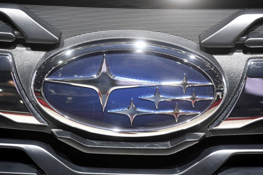 A closeup shot of the Subaru brand logo at the 2018 Geneva Motor Show