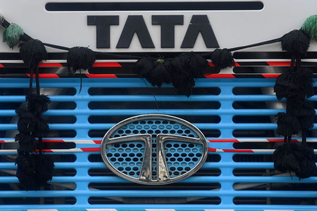 The Tata Motors logo and signage on an engine grille in Mumbai, India