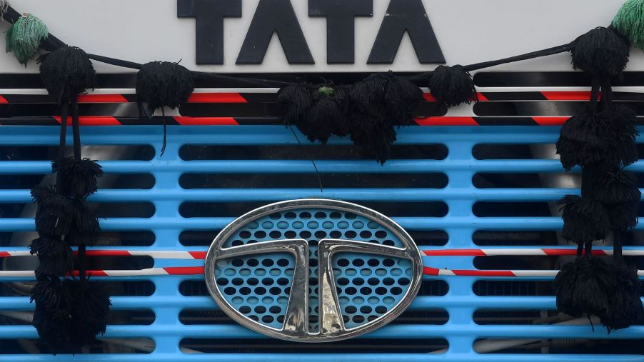 The Tata Motors logo and signage on an engine grille in Mumbai, India