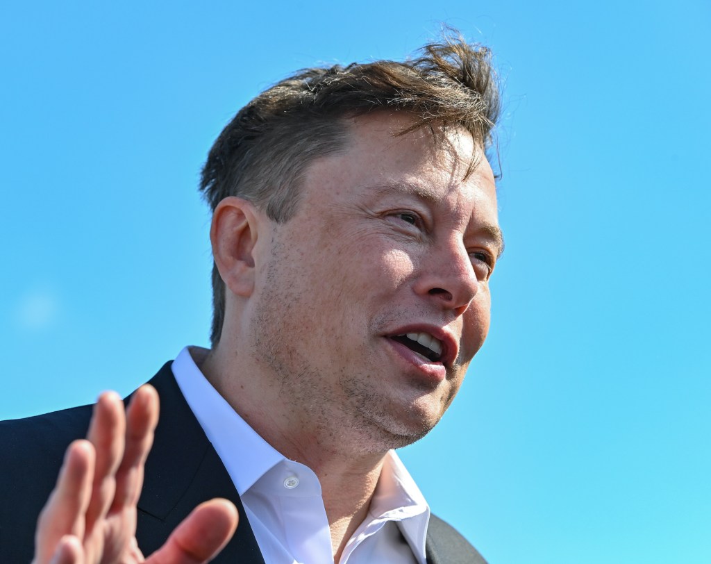 Tesla CEO Elon Musk stands on the construction site of the Tesla Gigafactory near Berlin, Germany, in September 2020