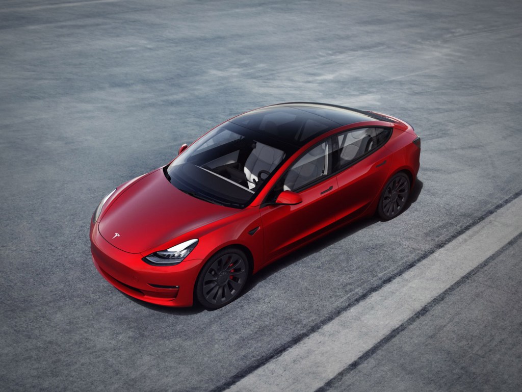 A red 2019 Tesla Model 3.